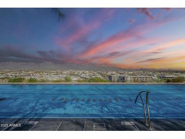 Enjoy the incredible mountain views from this community's rooftop pool at sunset at 7180 E Kierland Blvd # 807, Scottsdale, AZ 85254