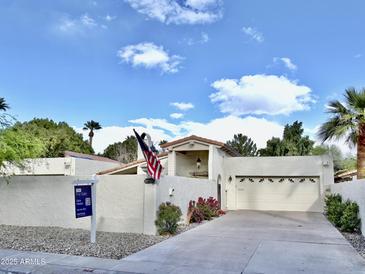 Charming single-Gathering home featuring a well-maintained yard and a two-car garage at 6841 N 3Rd Pl, Phoenix, AZ 85012