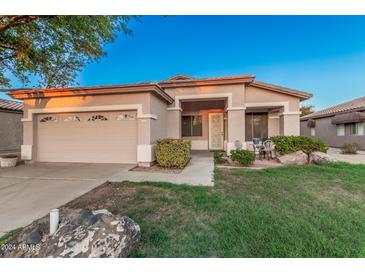 Charming single-Gathering home featuring a two-car garage and low maintenance landscaping at 1939 S Noble --, Mesa, AZ 85209