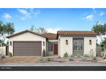 Inviting single-story home with a two-car garage, landscaped front yard, and a classic tile roof at 1910 E Empeltre Rd, San Tan Valley, AZ 85140