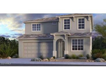 Beautiful two-story home with a two car garage and charming architectural details at 16807 W Hope Dr, Surprise, AZ 85388