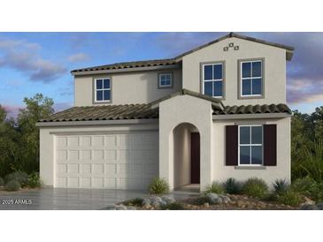 Charming two-story home with a two-car garage and neutral-colored stucco exterior at 25192 N 172Nd Dr, Surprise, AZ 85387