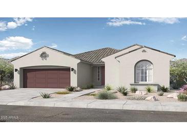 Charming single-story home showcasing a clean stucco exterior, brown garage door, and desert landscaping at 14334 W Calle Lejos Rd, Surprise, AZ 85387