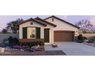 Charming single-story home with a neutral color palette, green shutters, and well-manicured landscaping at 25286 N 156Th Ln, Surprise, AZ 85387