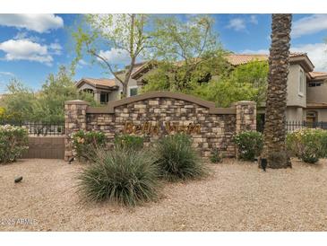 Stone community sign featuring lovely greenery and beautiful desert landscaping at 14000 N 94Th St # 2144, Scottsdale, AZ 85260