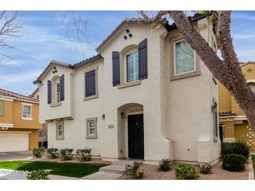 Charming two-story home with black shutters and well-maintained landscaping at 4289 E Jasper Dr, Gilbert, AZ 85296