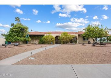 Charming single story home with red tile roof, mature trees, and desert landscaping at 1213 W Esplanade St, Mesa, AZ 85201