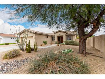 Charming single-story home featuring desert landscaping and a well-maintained exterior at 14686 W Clarendon Ave, Goodyear, AZ 85395