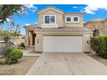 Charming two-story home featuring a two-car garage and low maintenance desert landscaping in a quiet neighborhood at 30404 N 43Rd St, Cave Creek, AZ 85331