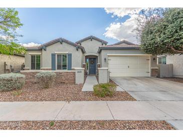 Charming single-story home features a welcoming facade and well-maintained landscaping at 3439 E Shannon St, Gilbert, AZ 85295