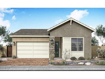 Charming single-story home showcasing a two-car garage, stone accents, and neutral color palette at 2152 E Mill Rd, San Tan Valley, AZ 85140