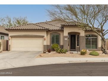 Charming single-story home with desert landscaping and a neutral color palette in a serene neighborhood at 2212 W Calle De Las Estrella St, Phoenix, AZ 85085