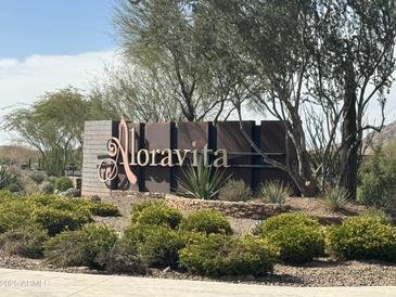 Landscaped community entrance sign features the community name, Aloravita at 26844 N 73Rd Dr, Peoria, AZ 85383