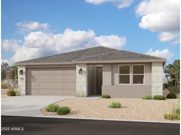 Charming single-story home with a two-car garage and neutral-toned exterior at 5639 W Summerside Rd, Laveen, AZ 85339
