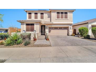 Charming two-story home with a well-maintained front yard and inviting curb appeal at 20846 E Longwood Dr, Queen Creek, AZ 85142