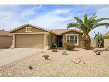 Charming single-story home with desert landscaping, two-car garage, and inviting curb appeal at 6390 S Granite Dr, Chandler, AZ 85249