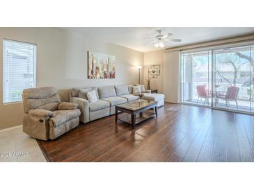 Living room features hardwood floors, comfortable seating and bright, natural light at 9750 N Monterey Dr # 50, Fountain Hills, AZ 85268
