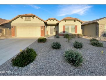 Charming single-story home featuring a low-maintenance landscape and neutral color scheme at 5133 S Brice --, Mesa, AZ 85212