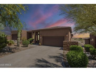 Attractive single-story home with a private driveway and mature desert landscaping at 16248 E Ridgeline Dr, Fountain Hills, AZ 85268