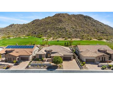 Exterior view of a single-Gathering home with desert landscaping near a golf course and mountain at 3529 N Boulder Canyon St, Mesa, AZ 85207