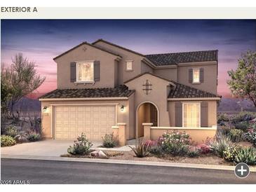 Charming two-story stucco home featuring a tiled roof and desert landscaping for relaxed outdoor living at 17633 W Palo Verde Dr, Litchfield Park, AZ 85340