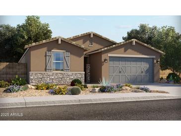 Inviting single-story home featuring a neutral color palette, charming stone accents, and a convenient two-car garage at 356 S Calle Miguel --, Casa Grande, AZ 85194