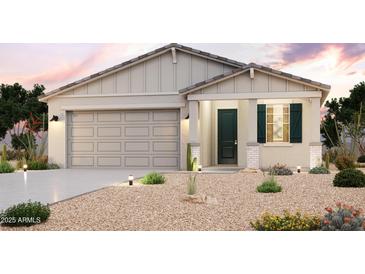 Charming single-story home with a desert landscape, neutral tones, and a well-lit entry at 1974 S 246Th Ln, Buckeye, AZ 85326