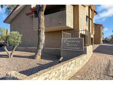 Charming condo building sign 