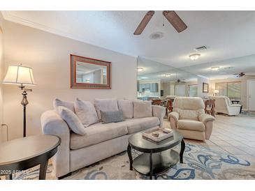 Cozy living room features plush furniture and a neutral color palette at 14300 W Bell Rd # 58, Surprise, AZ 85374