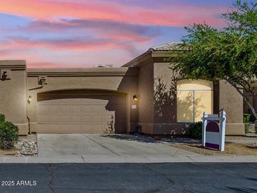 Charming single story home with a two-car garage and desert landscaping at 4722 E Casey Ln, Cave Creek, AZ 85331