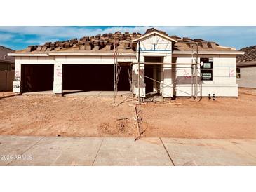New construction home featuring a two-car garage and a modern design at 12456 E Bahia Ct, Florence, AZ 85132