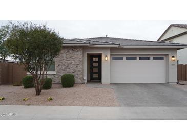 Beautiful single-story home features stone accents and a two-car garage at 4090 S Virginia Way, Chandler, AZ 85249