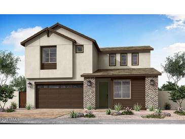 Modern two-story home featuring a brick facade, dark garage door, and stylish architectural details at 1481 E Prescott St, Gilbert, AZ 85298