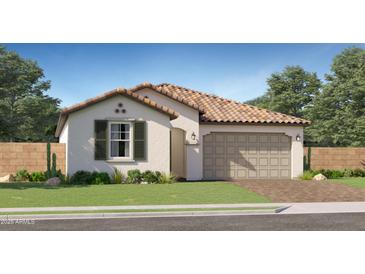 Charming single-story home featuring a tiled roof, attached garage, and manicured front lawn at 20900 S 231St Way, Queen Creek, AZ 85142