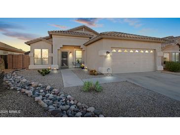 Charming single-story home with desert landscaping, gravel, stone, and a well-manicured walkway leading to the front door at 2537 E Vista Bonita Dr, Phoenix, AZ 85024
