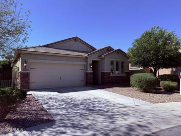 Charming single-story home with a well-manicured lawn and a two-car garage, offering great curb appeal at 3717 E Lodgepole Dr, Gilbert, AZ 85298
