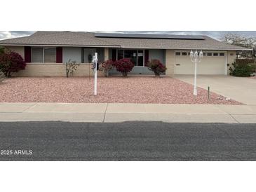 Charming single-story home with well maintained yard and solar panels at 16805 N 110Th Ave, Sun City, AZ 85351
