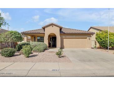 Charming single-story home featuring desert landscaping and a tile roof at 2857 N Mystic Ct, Casa Grande, AZ 85122