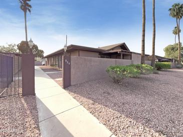 Charming single-story home with stucco walls and desert landscaping at 930 S Acapulco Ln # D, Tempe, AZ 85281