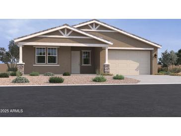 Charming single-story home with a two-car garage, desert landscaping, and a classic Southwestern design at 15777 W Cheryl Dr, Waddell, AZ 85355