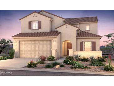 Charming two-story home featuring a warm color palette, tiled roof, and well-maintained landscaping at 17822 W Encinas Ln, Goodyear, AZ 85338
