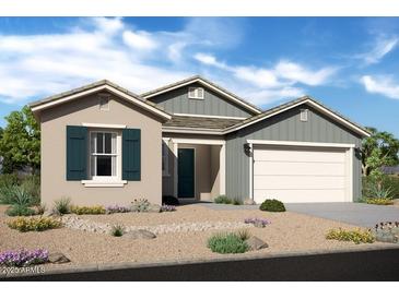 Charming single-story home featuring desert landscaping, a two-car garage, and a stylish gray and beige color scheme at 20373 W Rovey Ave, Buckeye, AZ 85396