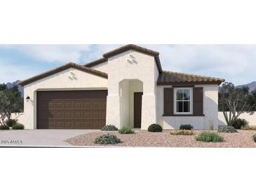 Charming single-story home with a two-car garage, neutral-toned exterior, and desert landscaping at 22819 E Lords Way, Queen Creek, AZ 85142