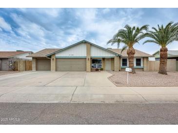 Charming single-Gathering home with a well-maintained front yard and a two-car garage at 3149 W Danbury Dr, Phoenix, AZ 85053