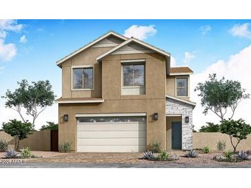 Charming two-story home featuring neutral exterior, two-car garage, and tasteful stone accents at 1565 E Tiffany Way, Gilbert, AZ 85298