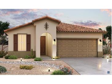 Charming single-story home featuring a tile roof, a two-car garage, and desert landscaping at 1339 S 215Th Dr, Buckeye, AZ 85326