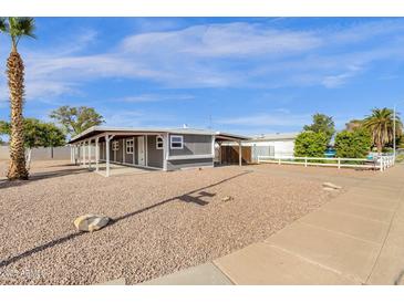 Charming home with covered parking and low-maintenance desert landscaping at 848 W Calle Del Norte --, Chandler, AZ 85225