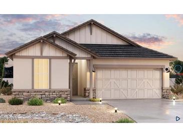 Charming single-Gathering home with stone accents, neutral paint, and a well-manicured desert landscape at 1351 S 215Th Dr, Buckeye, AZ 85326