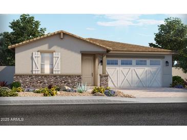 Charming single-story home features a two-car garage, stone accents, and desert landscaping at 24501 W Grenadine Rd, Buckeye, AZ 85326