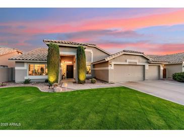 Charming single-story home with desert landscaping and a three-car garage in a desirable neighborhood at 3921 W Sheffield Ave, Chandler, AZ 85226